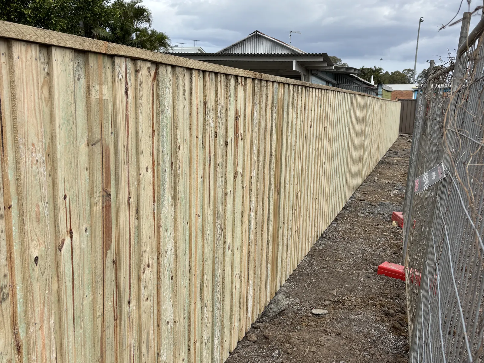 New paling fence down a side passage