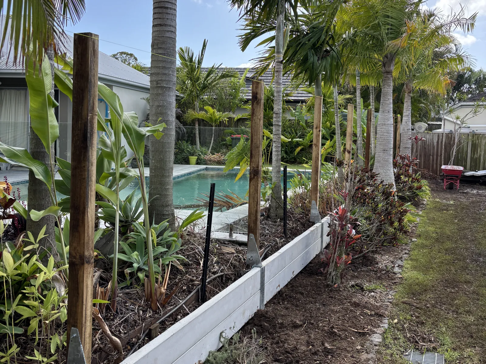Low sleeper garden bed wall