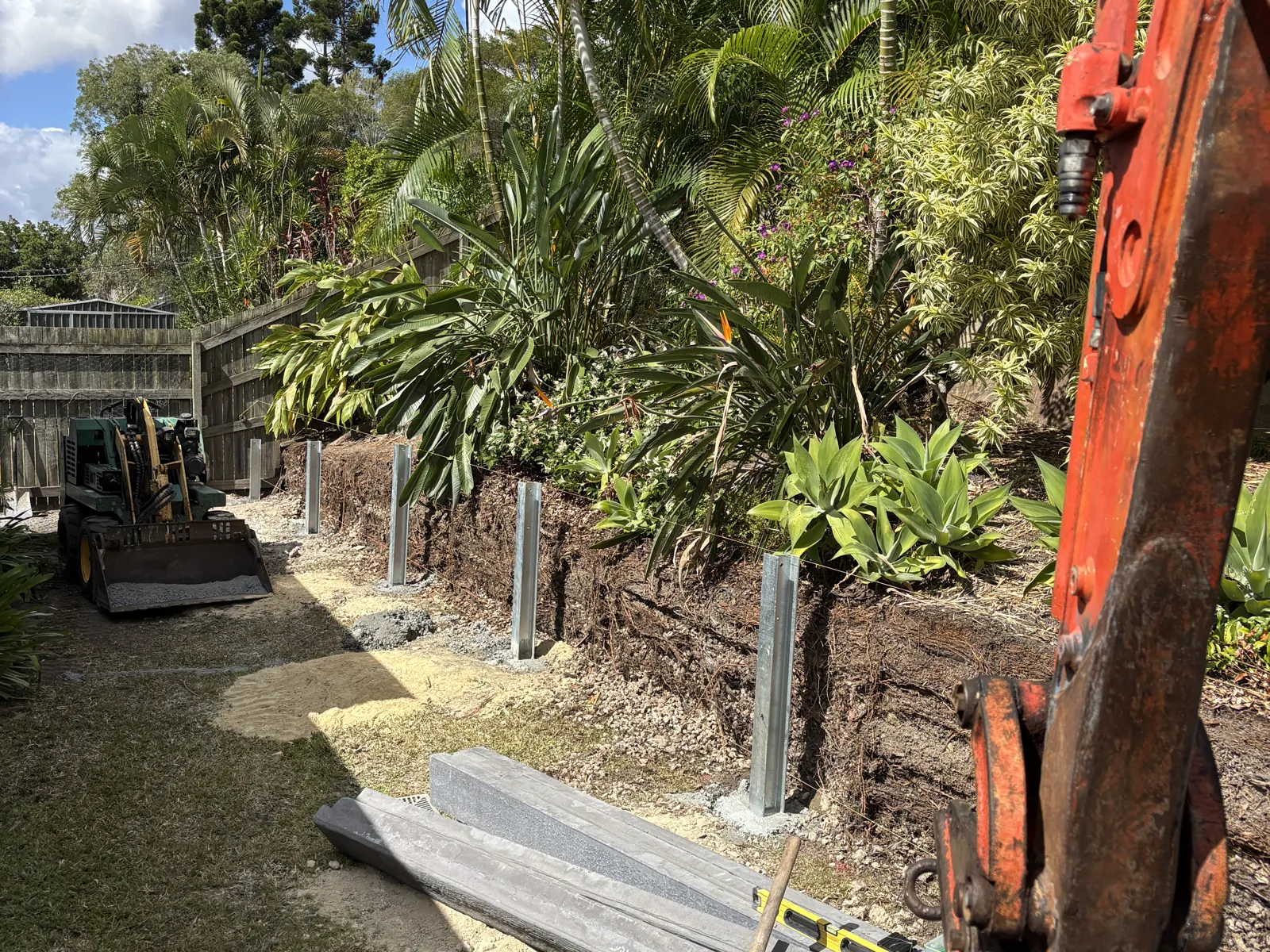 Lifting a concrete sleeper into place